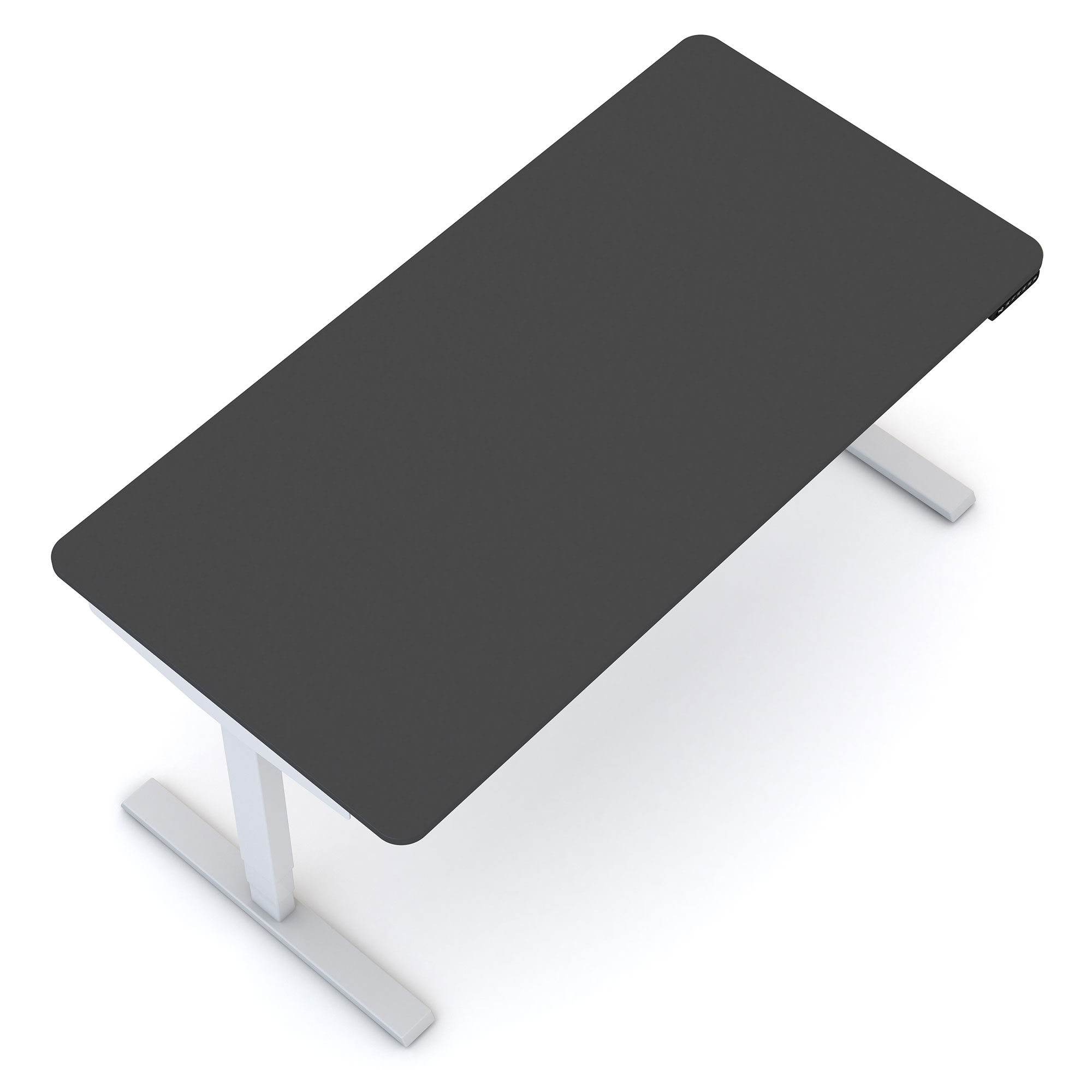 Schreibtisch mit dunkler Tischplatte und weißem Untergestell aus der Vogelperspektive.