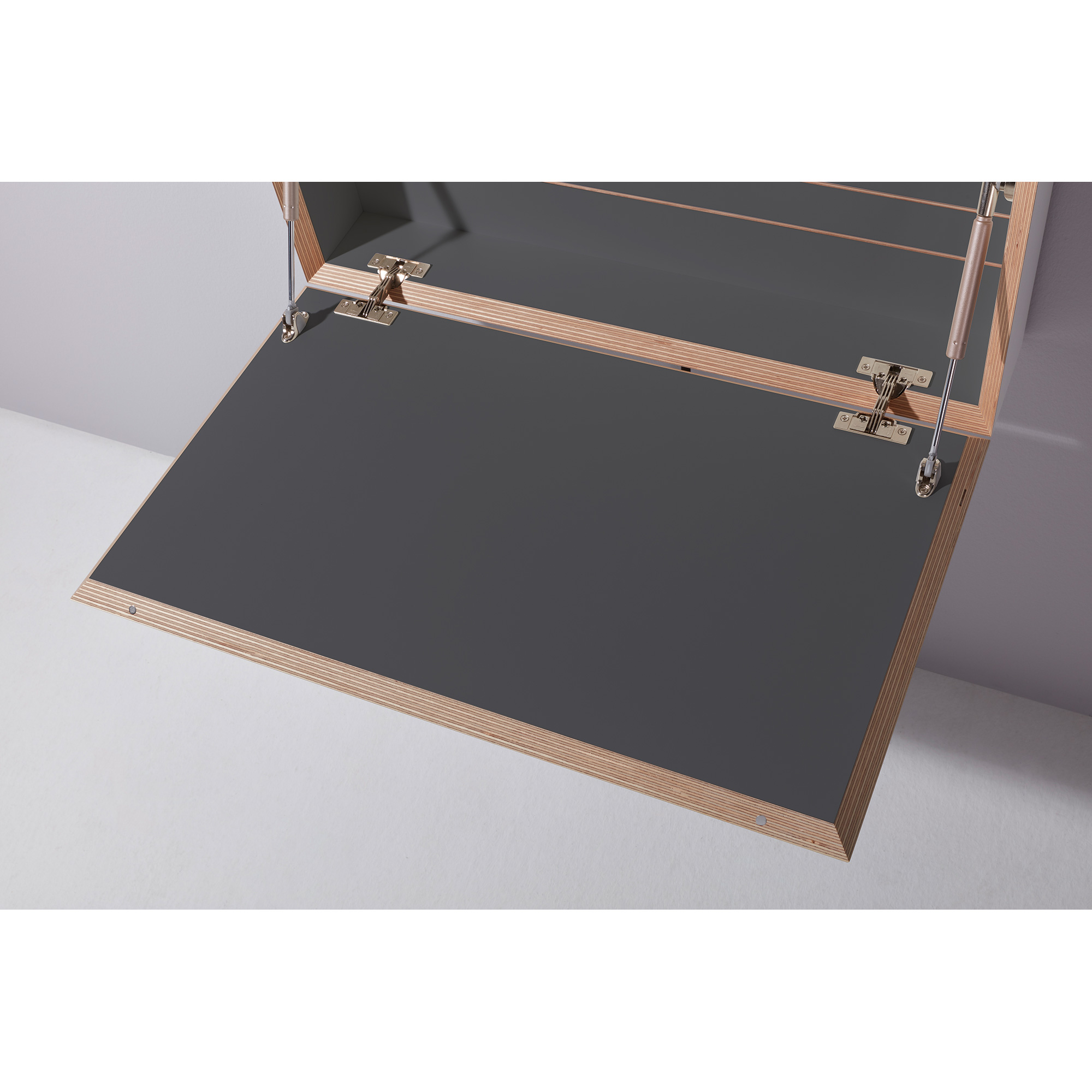 Ein grauer Tisch mit einer Holzumrandung und einem klappbaren mechanischen Element.