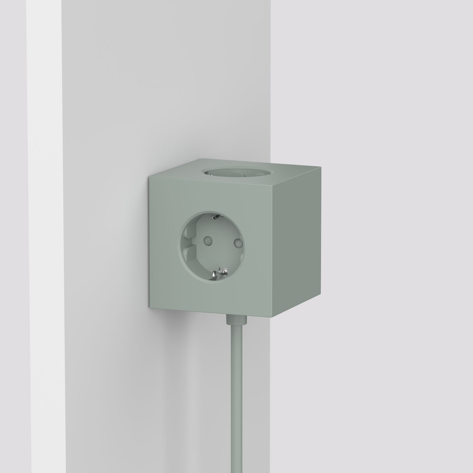 Würfelförmige AVOLT Mehrfachsteckdose in Grün mit Verlängerungskabel – moderne Wandlösung für Designliebhaber im Wohnraum oder Büro
