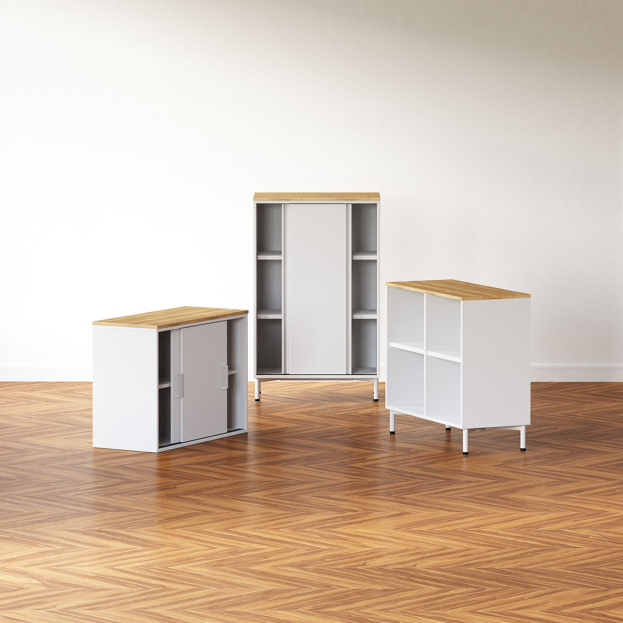 Drei weiße Sideboards mit Holzplatten auf Holzfußboden vor heller Wand.