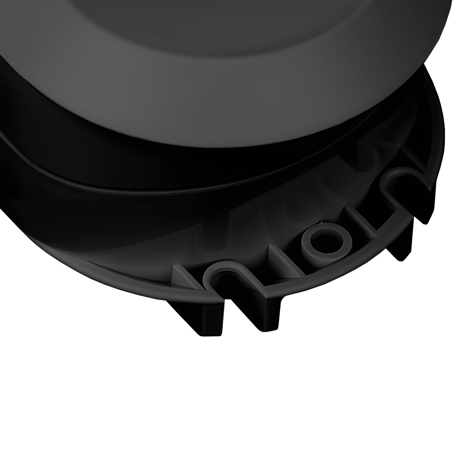 Detailansicht der Unterseite eines schwarzen Hockers mit sichtbarer rutschfester Struktur